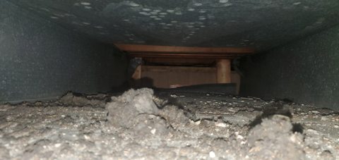 Poussière dans un conduit de ventilation